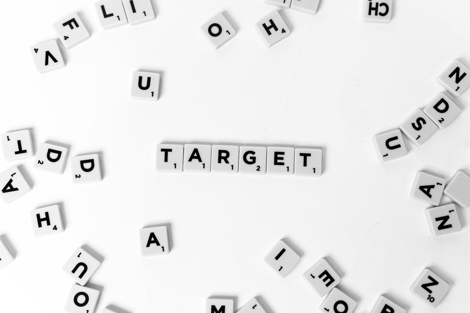 a target word spelled with scrabble tiles